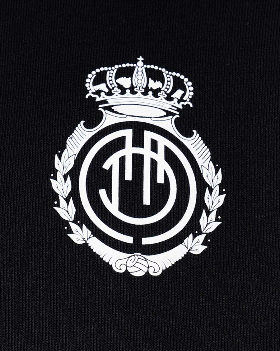 Dessuadora infantil amb caputxa RCD Mallorca Fanswear 2023-2024 de color blanc i negre
